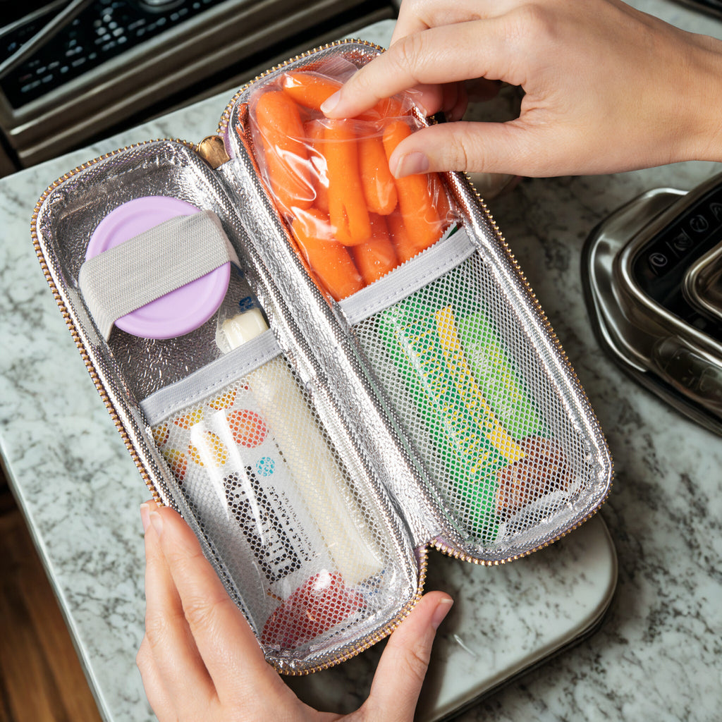 Insulated snack storage container with compartments  that keep healthy snacks chilled while on the go.